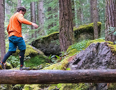 man hiking in forest