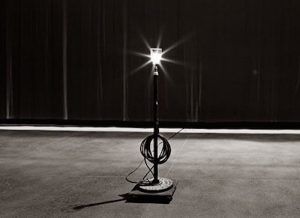 Ghost light on a bare stage